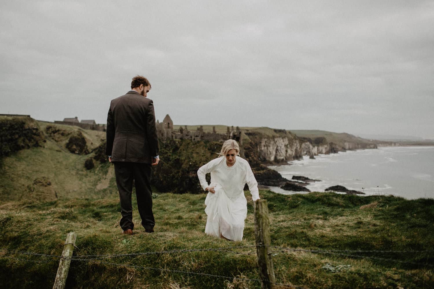 adventure elopement photographer Northern Ireland Dunluce Castle