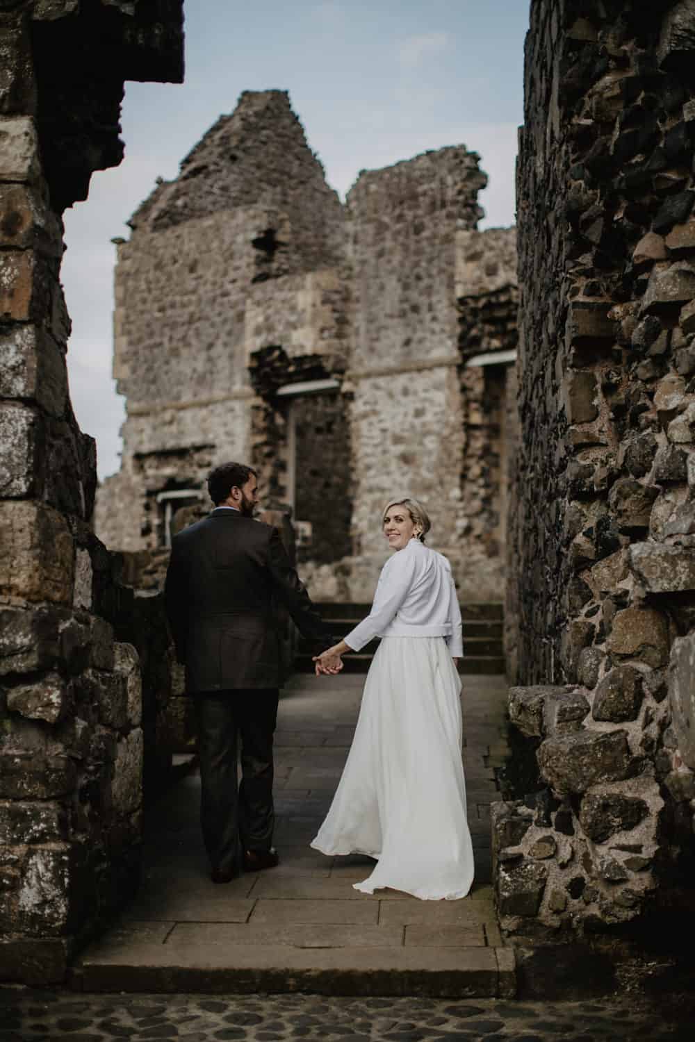 adventure elopement Northern Ireland Dunluce Castle